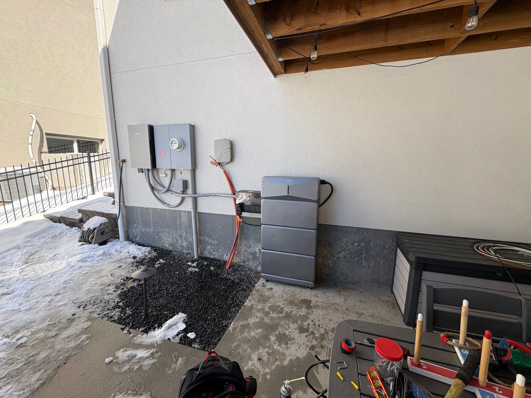 Anker SOLIX whole-home battery backup and inverter installed outdoors